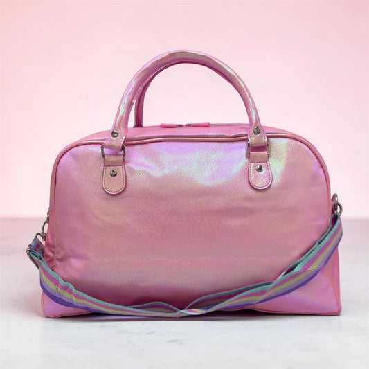 Shimmery pink duffel bag with top handles, front zipper, and colorful striped strap
