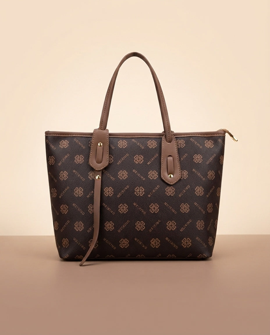 Structured tote and crossbody bag set with dark monogram pattern, taupe handles and pouch
