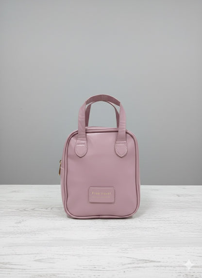 Pink leather-look makeup bag with top handle and front logo label