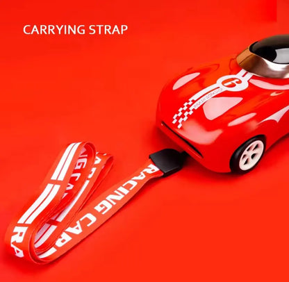 Red car-shaped sipper bottle with carrying strap and black lid
