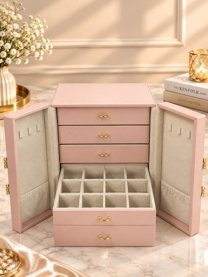 Pink jewelry storage box open with top drawer tiers and multi-slot organizer tray