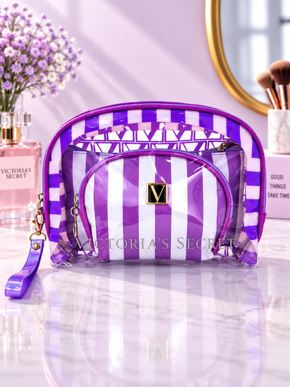 Purple and white striped cosmetic organizer with clear zip pouches and V logo patch