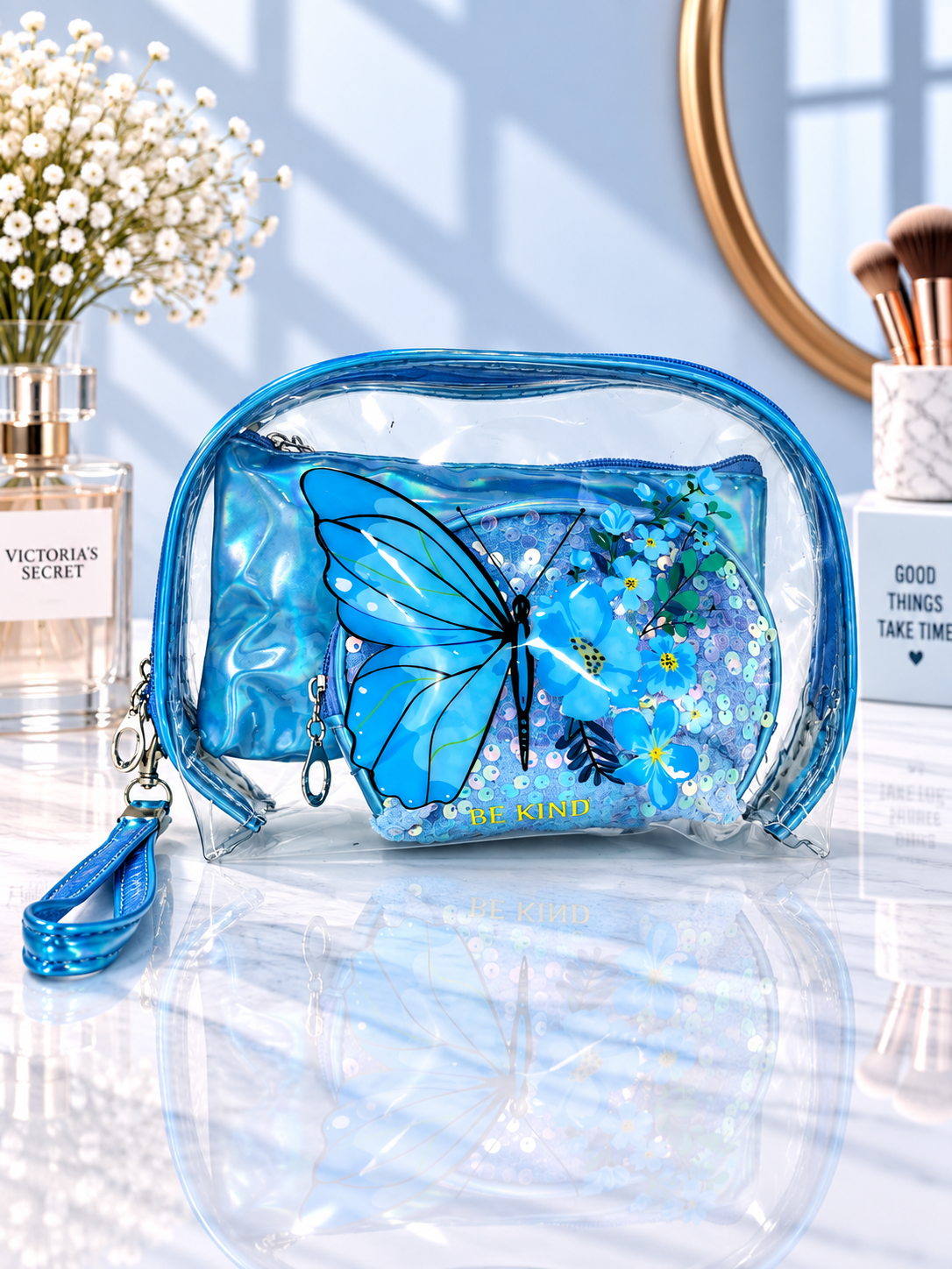 Blue 3-in-1 cosmetic organizer, large butterfly graphic, 'BE KIND' quote