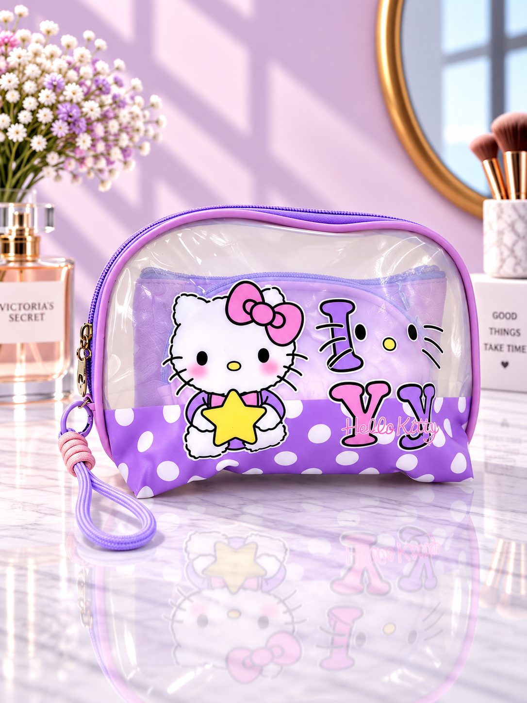 Purple polka dot Hello Kitty 3-in-1 cosmetic organizer with clear zip pouch and wrist strap