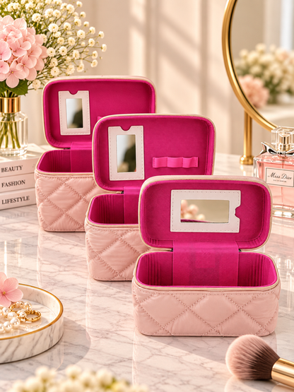 Quilted vanity box set in soft pink with open compartments, zippered quilted boxes