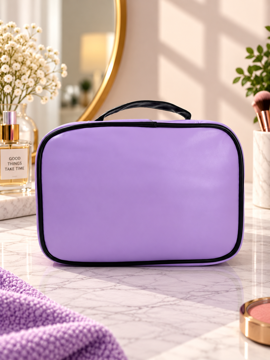 Purple cosmetic bag with black trim and top handle