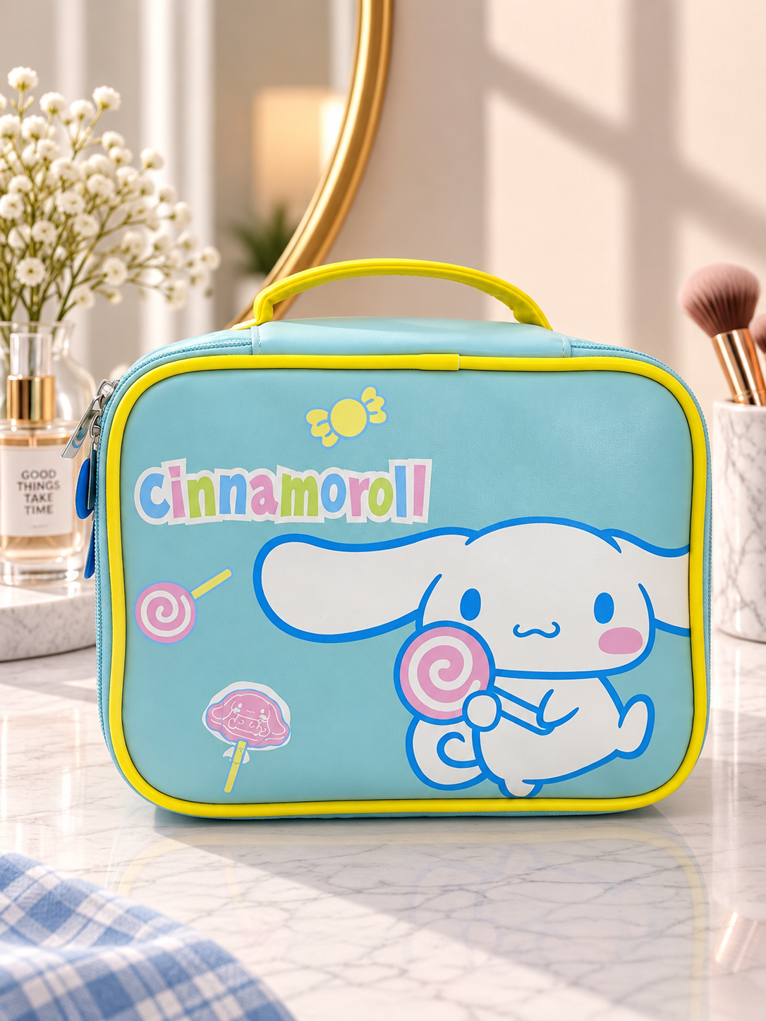 Light blue Cinnamoroll cartoon print cosmetic bag with yellow trim, top handle and zipper