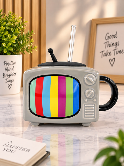Grey ceramic TV-style mug with black handle, lid, and colorful screen