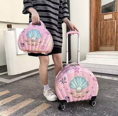 Pink seashell rolling suitcase with matching vanity bag