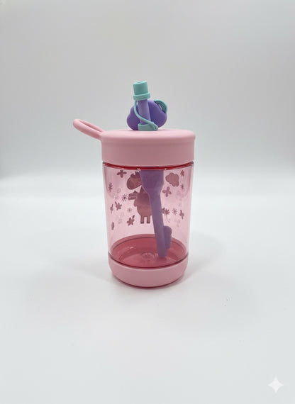 Pink unicorn sipper cup with flip-top lid, straw, and unicorn graphic