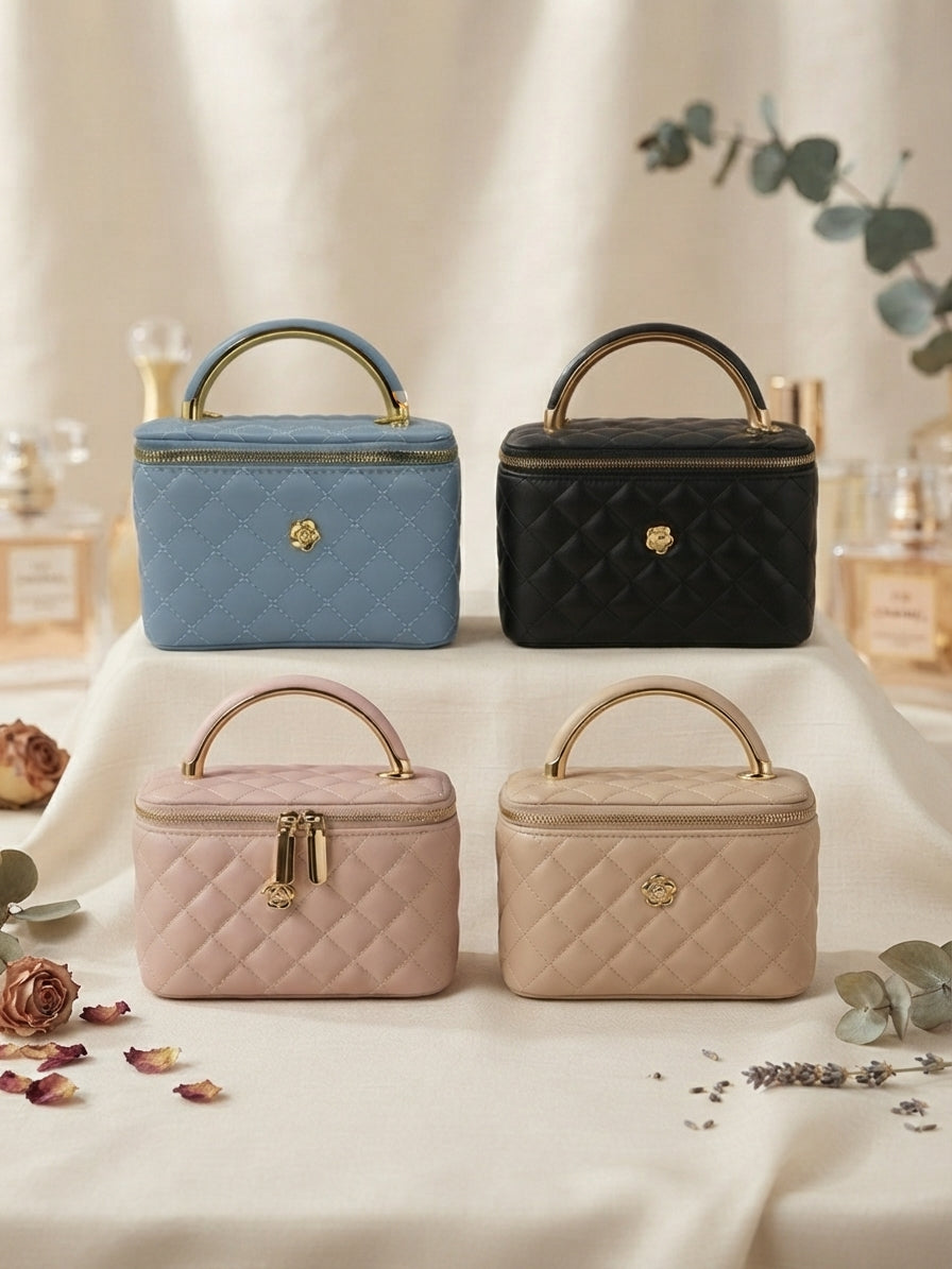 Set of quilted cosmetic cases with metal handles: blue, black, pink, and beige