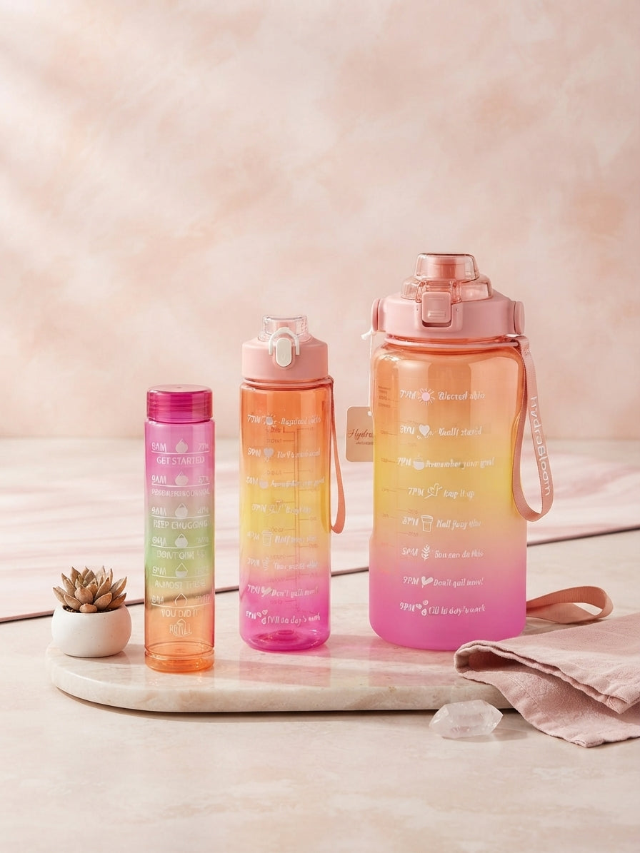3-piece gradient motivational water bottle set, orange to pink with flip tops and carry strap