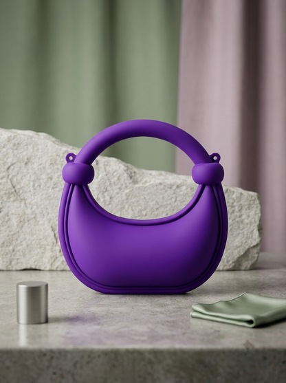 Purple matte silicone crescent handbag with rounded ring handles and knotted beads