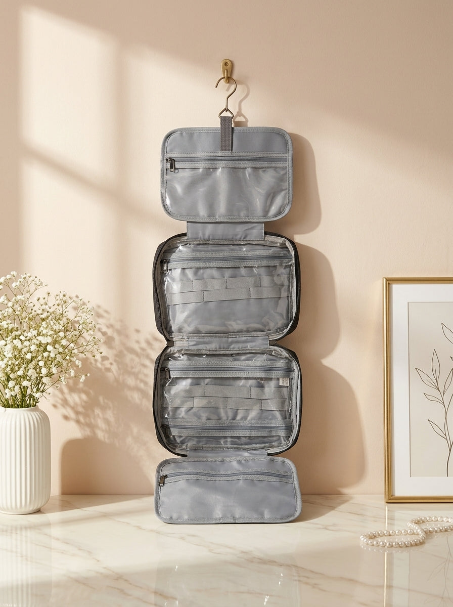 Gray quilted hanging toiletry organizer set with three zip compartments and top hook