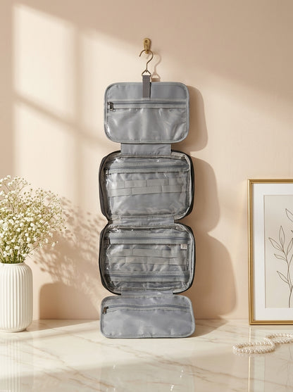 Gray quilted hanging toiletry organizer set with three zip compartments and top hook