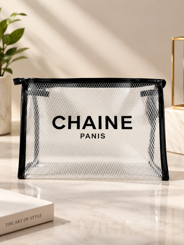 Rectangular black zip-top mesh pouch with transparent front and CHAINE Paris text