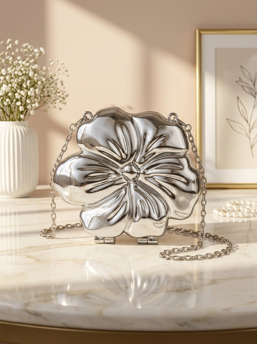 Silver metallic floral bloom evening clutch bag with chain handle