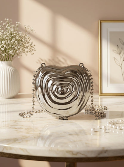 Silver metallic ripple heart evening clutch with chain strap and bead accents