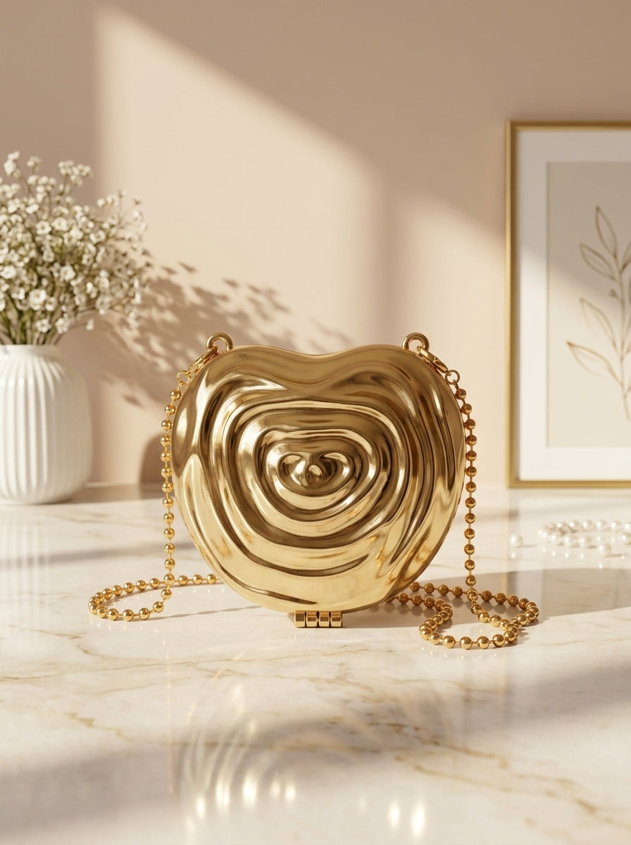 Gold metallic ripple heart evening clutch with chain strap and bead accents