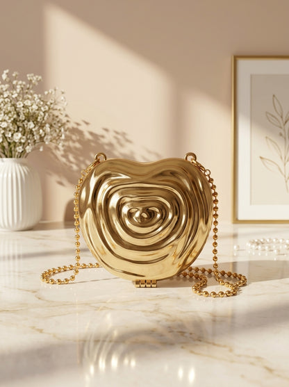 Gold metallic ripple heart evening clutch with chain strap and bead accents