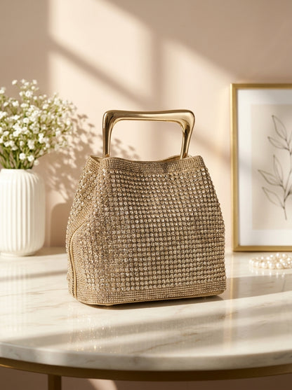 Gold crystal mesh bucket clutch with top handle and structured shape