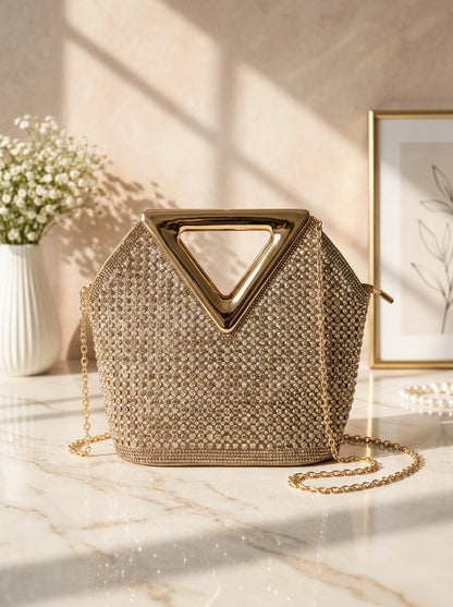 Gold-tone crystal mesh evening clutch with triangular cutout handle and chain strap