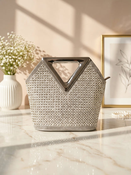 Silver-tone crystal mesh evening clutch with triangular cutout top handle