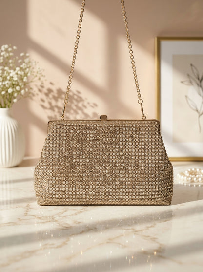 Gold pavé crystal evening clutch with chain strap