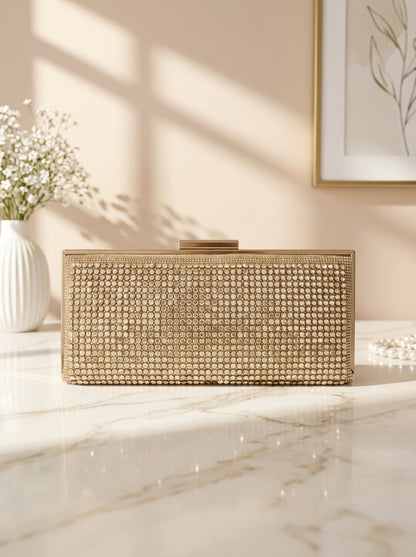 Crystal pavé evening clutch in champagne gold with rectangular hard shell design