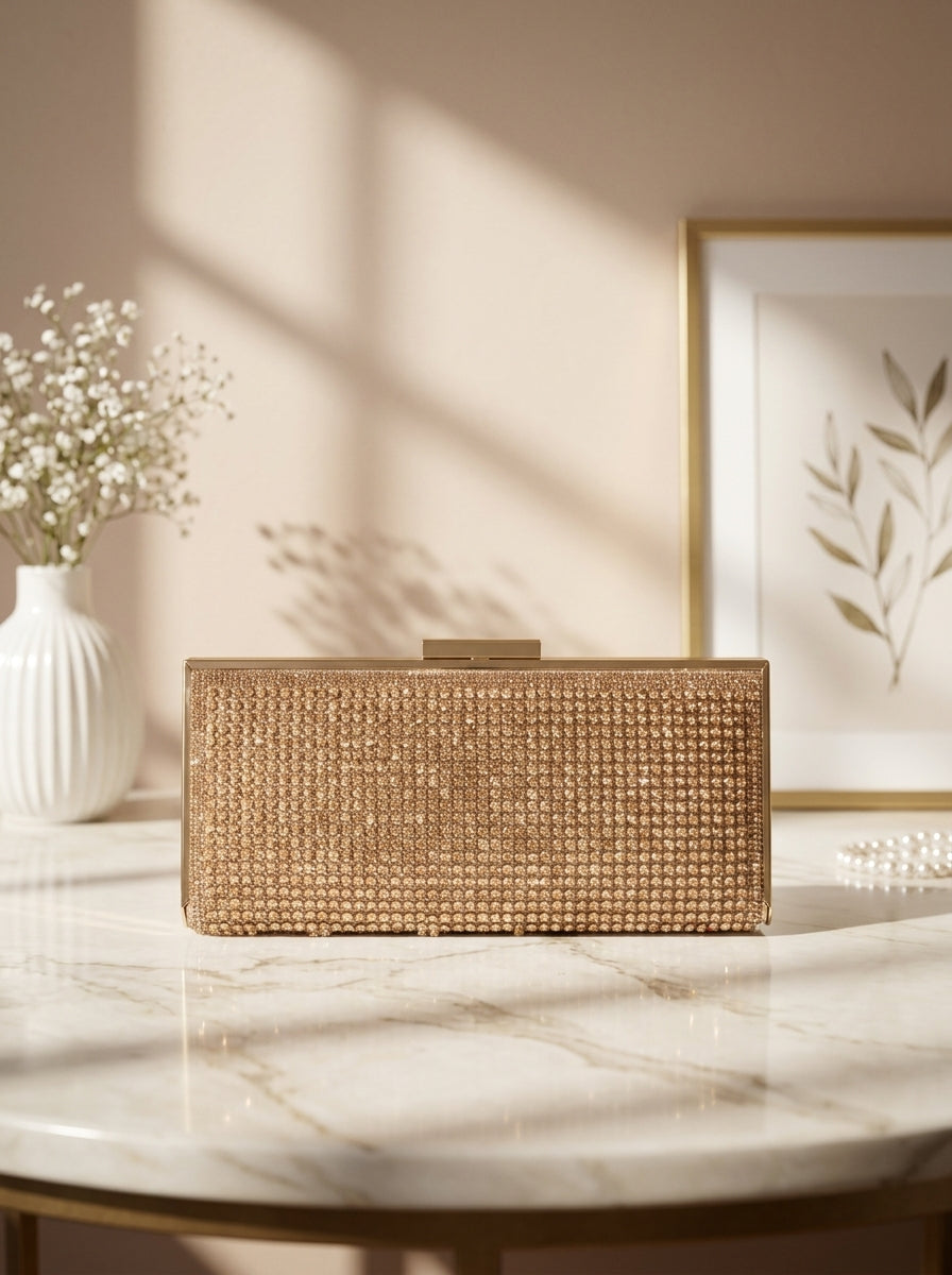 Rectangular crystal pavé evening clutch in champagne gold with top clasp