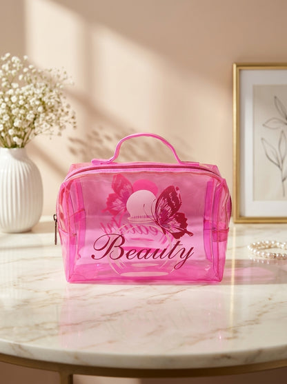Pink transparent cosmetic pouch with handle and “Beauty” graphic print