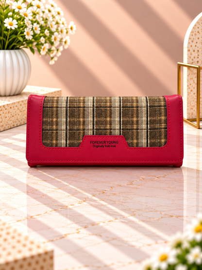 Long plaid contrast wallet with burgundy outer trim and snap front flap