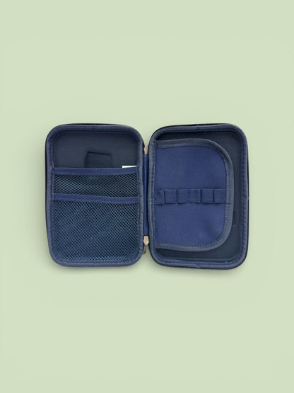 Stationery organizer case open with blue fabric interior and mesh pocket