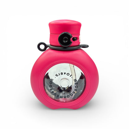 Pink round water bottle with black lid insert and side handles, clear front window.
