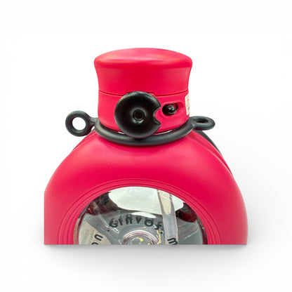 Pink round water bottle with black lid insert and side handles, close-up top and front.