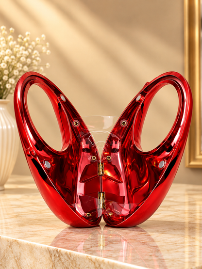 Red metallic crescent evening handbag with glossy finish and chain straps