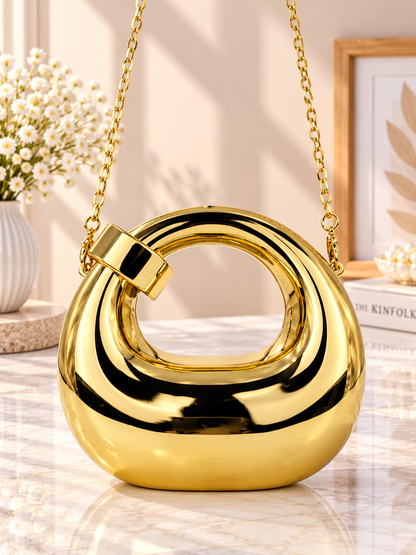 Gold metallic ring-loop evening handbag with short chain handles