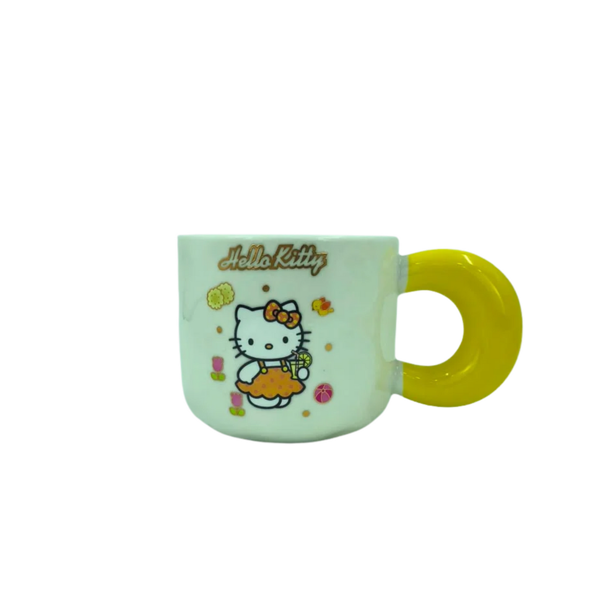 Ceramic coffee mug with yellow handle and Hello Kitty print on mint body.
