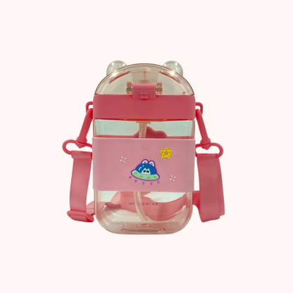Kids water bottle with straw and strap, pink unicorn-rainbow cartoon graphic, red side strap.