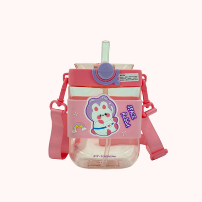 Kids water bottle with straw and strap, pink bunny cartoon graphic, red lid and side handles.