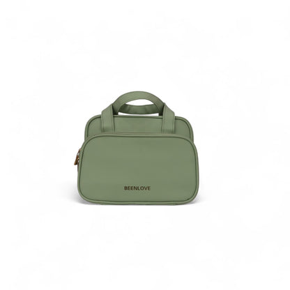 Green travel vanity case with top handle, front zipper, BEELNOVE logo.
