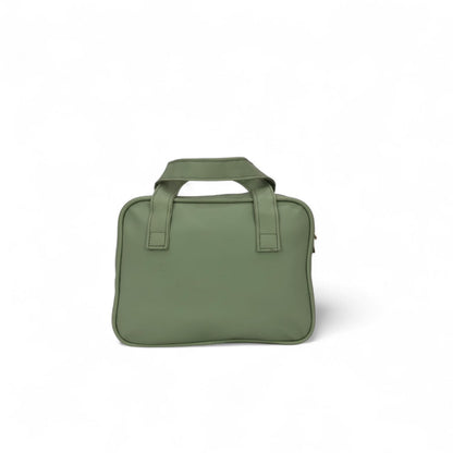 Green travel vanity case with top carry handles and rounded compact design.