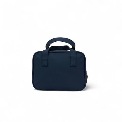 Navy travel vanity case with two top carry handles and compact rounded shape.