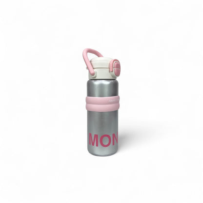 Kids stainless steel water bottle with pink lid and pink carry handle, angled view