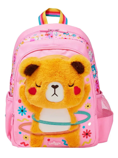 14-inch pink plush bear backpack, front features bear face patch and rainbow top handle.