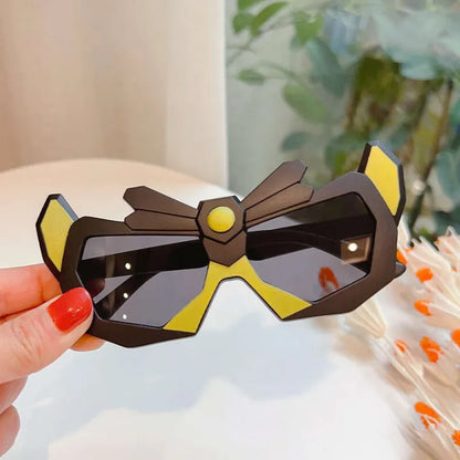 Kids shield sunglasses, dark frame with yellow accents and dark lenses