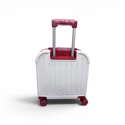 White trolley suitcase with red base panel, upright telescoping handle, pink wheels