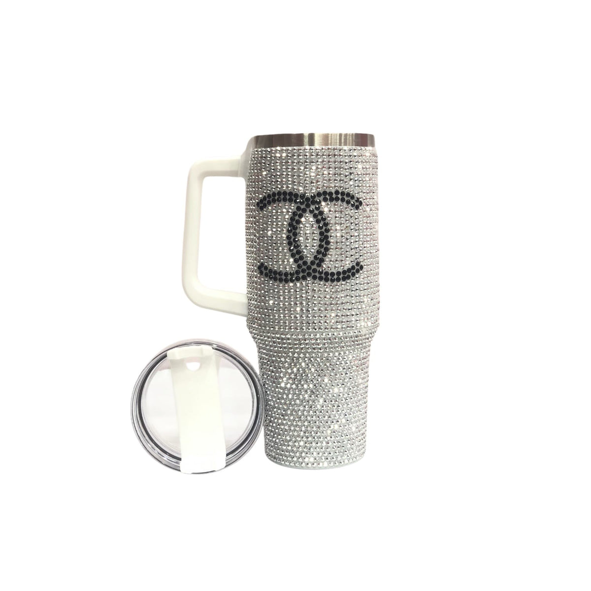 Silver rhinestone tumbler with white handle, clear lid, and black CC-style logo