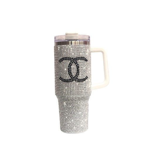Silver rhinestone tumbler with white handle and clear lid, black CC-style logo