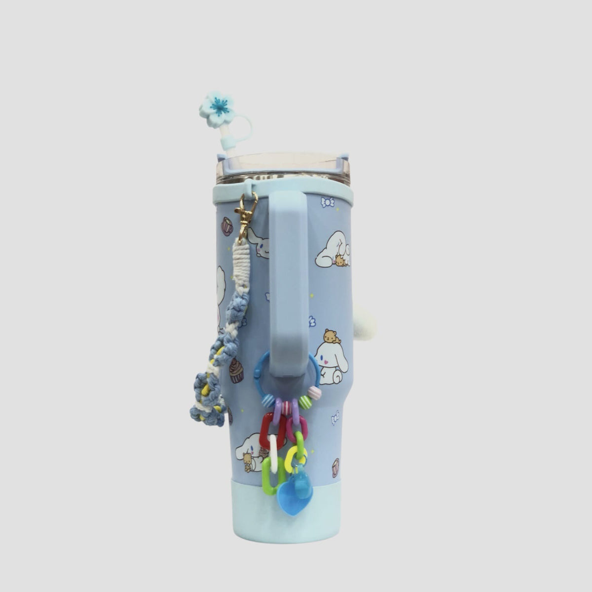 Light blue character tumbler side view with all-over character print and straw top